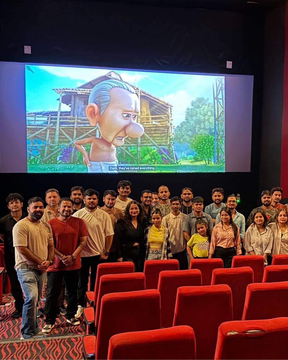 The team at a cinema premiere, their animated film on the big screen